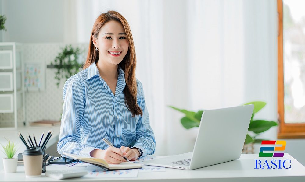 Asian businesswoman working in finance and calculator working with laptop computer with paper documents at office Technology market and financial concepts